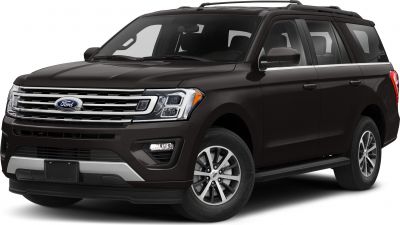Large SUV with wide chrome grille and roof rails