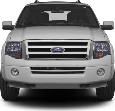 Front view with grille, headlights, fog lights and wide stance