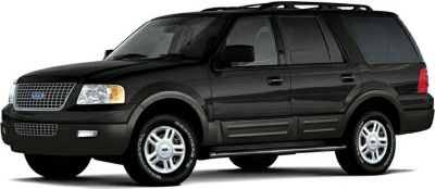 Black large SUV side view with chrome wheels and roof rack