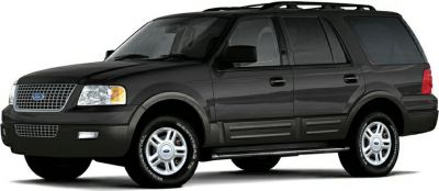 Side profile view of full-size SUV with tinted windows and running boards
