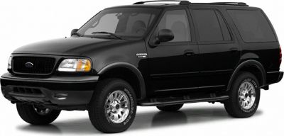 Black full-size SUV front and side view with rugged tires and roof rack.