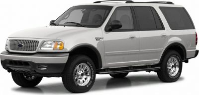 Silver SUV with roof rails and alloy wheels visible from front side