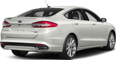 Rear and side view with spoiler, tail lights, and dual exhausts.