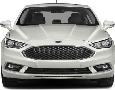 Front view showing hexagonal grille and LED headlights