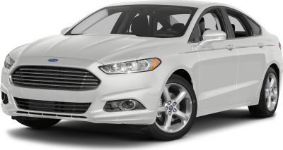 Front view with grille, headlights, and alloy wheels of a white mid-size sedan