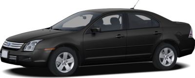 Black four-door sedan front side view with alloy wheels
