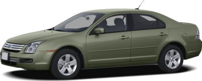 Four-door sedan with alloy wheels in side view