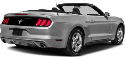 Rear view of convertible with open roof and distinctive taillights