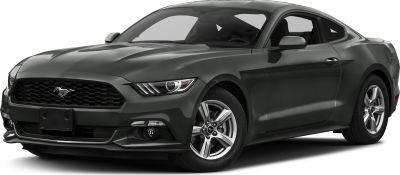 Front-side view of a muscle coupe with aggressive grille and alloy wheels