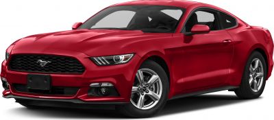 Front side view of red sports coupe with bold grille and headlights