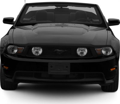 Front view with prominent grille and dual round headlights