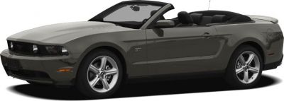 Grey open-top sports convertible with five-spoke alloy wheels