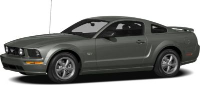Sporty coupe with rear spoiler and five-spoke wheels