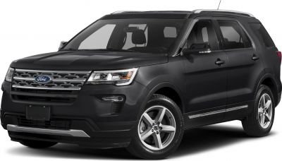 Black SUV with angular headlights and five-spoke alloy wheels