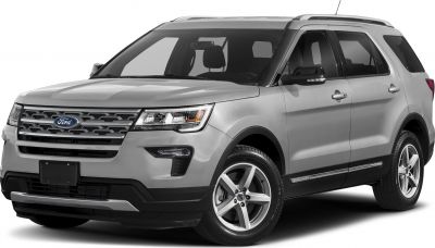 Front-side view of modern SUV with detailed grille and headlights