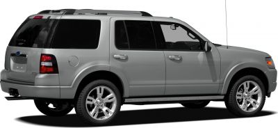 Silver SUV side and rear profile with roof rails and tinted windows
