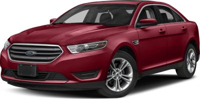 Red mid-size sedan front side with modern grille and headlights
