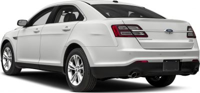 White sedan rear and side view with taillights and dual exhaust