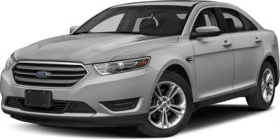 Silver sedan with modern grille, sharp headlights, and alloy wheels