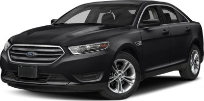Black sedan front side view with alloy wheels and modern headlights