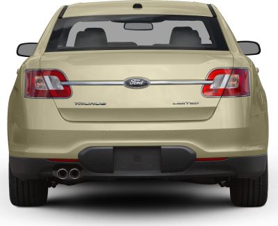 Rear view with taillights, chrome strip, dual exhaust