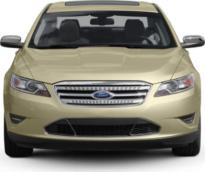 Front view with chrome grille and angular headlights