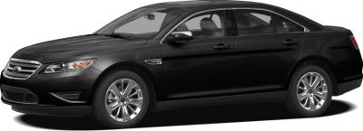Side profile of a black sedan with chrome grille and alloy wheels