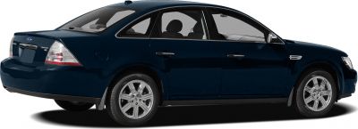 Rear-side view of mid-size sedan with alloy wheels and tinted windows.