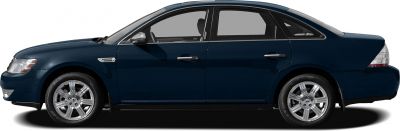 Side profile of a sedan with prominent alloy wheels