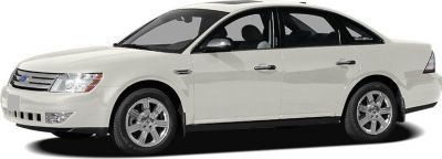 White sedan side profile with alloy wheels and clean body lines