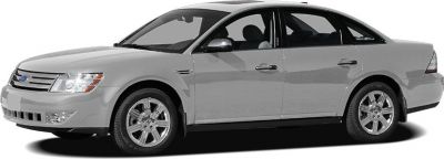 Silver four-door sedan with alloy wheels and sunroof, side profile