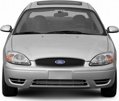 Front view of a compact sedan with distinct grille and integrated headlights