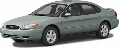 Front side profile of mid-size sedan with clear headlights and alloy wheels