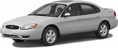 Silver four-door sedan with sunroof and alloy wheels