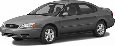 Gray four-door sedan with alloy wheels and aerodynamic styling