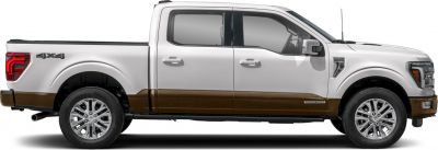 Side profile of four-door lifted pickup with dual-tone paint and 4x4 badge