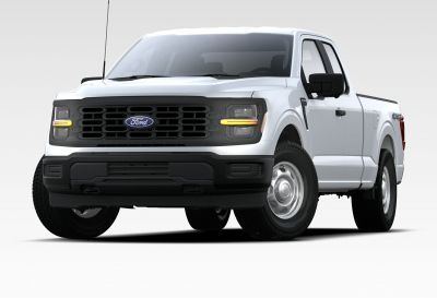 White pickup truck with black grille and LED headlights