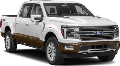Front-side view showing dual-tone paint and bold grille of large pickup