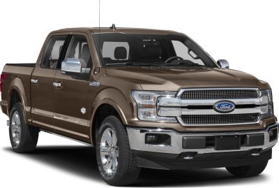Front and side view of a large pickup with chrome grille and FX4 off-road package.