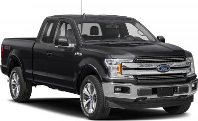 Black pickup truck front side with chrome grille and 4x4 badge