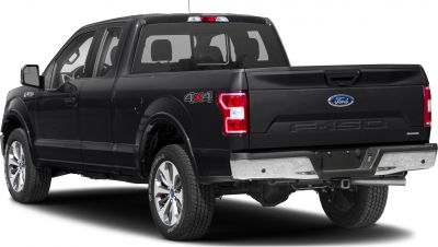 Rear and side view of black pickup truck with 4x4 badge and chrome bumper
