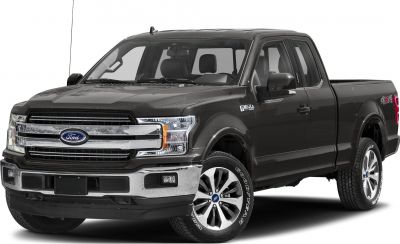 Front view of black pickup truck with chrome grille and alloy wheels