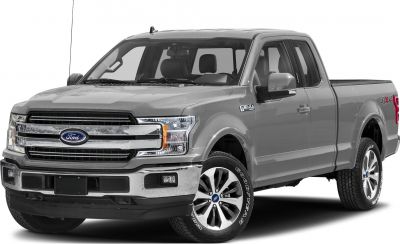 Front side view of extended cab pickup truck with chrome grille