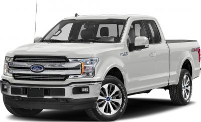 Front-side view of a white pickup with chrome grille and alloy wheels