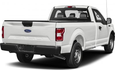 Rear exterior view of a white pickup truck with regular cab and tailgate.