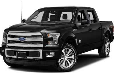 Front-side view of a black pickup featuring grille, headlights, and alloy wheels
