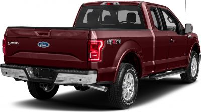 Rear view of a 4x4 pickup with tailgate and dual exhaust