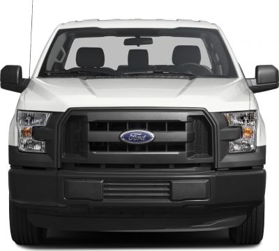 Front view with bold black grille and rectangular headlights