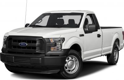 Front and side view of white pickup with black grille and steel wheels