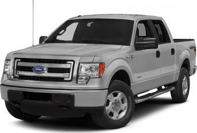 Front-side view of a pickup truck with prominent grille and side steps